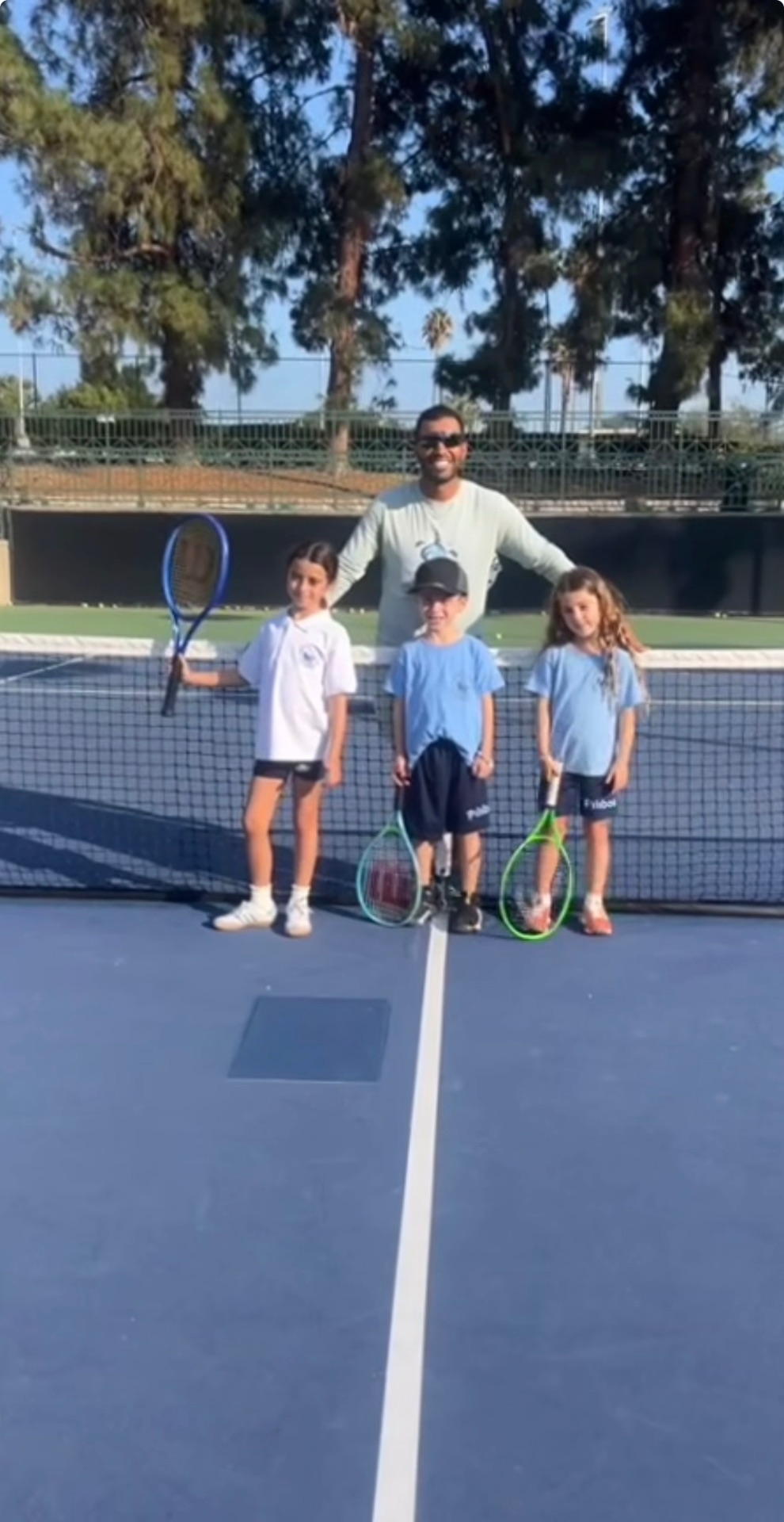 Junior group photo at the net