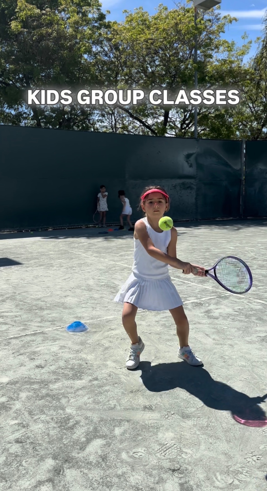 Young player hitting a backhand